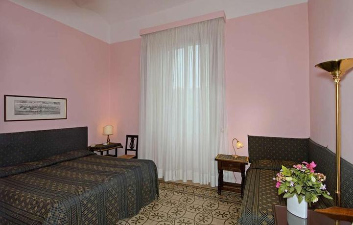 Imagen de la habitación del Hotel Rex, Lucca. Foto 13