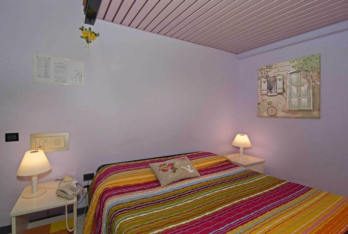 Imagen de la habitación del Hotel Rex, Lucca. Foto 14