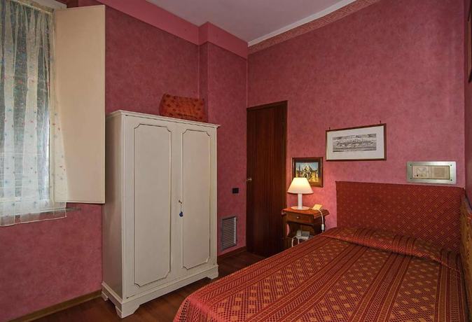 Imagen de la habitación del Hotel Rex, Lucca. Foto 15