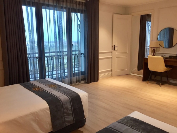 Imagen de la habitación del Hotel Rex Quang Binh. Foto 17