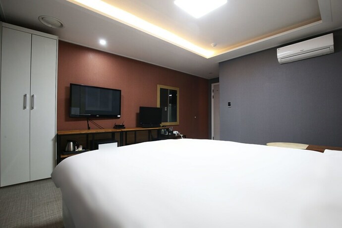 Imagen de la habitación del Hotel Rexhotel. Foto 21