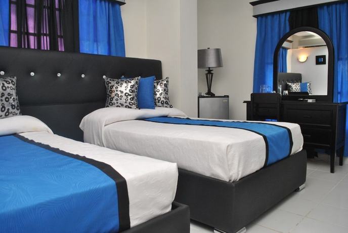 Imagen de la habitación del Hotel Rey, La Vega. Foto 16