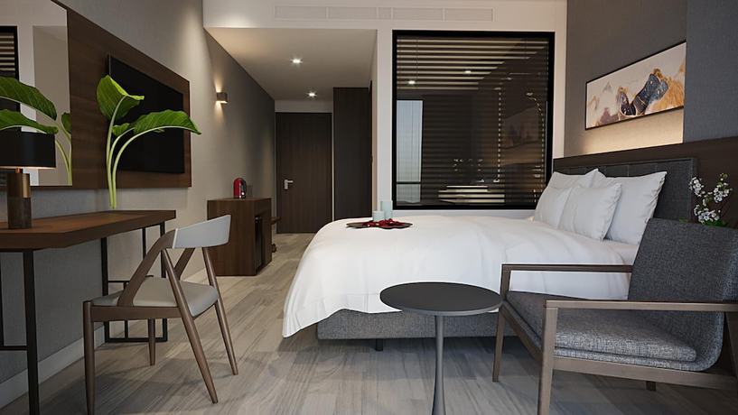 Imagen de la habitación del Hotel Reyna Hanoi. Foto 18