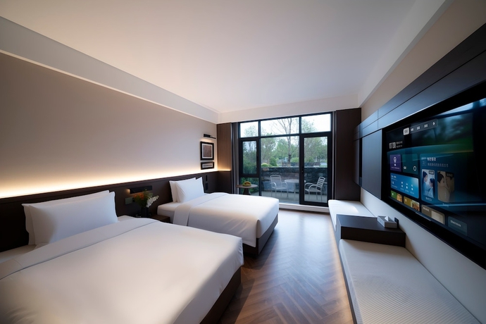 Imagen de la habitación del Hotel Rezen Banshan Yunpu. Foto 6
