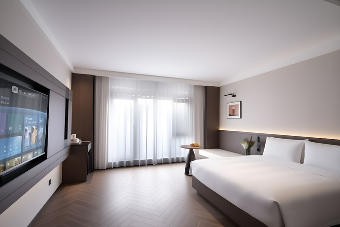 Imagen de la habitación del Hotel Rezen Banshan Yunpu. Foto 7