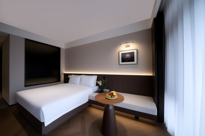 Imagen de la habitación del Hotel Rezen Banshan Yunpu. Foto 8