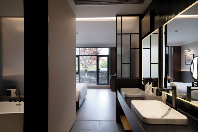 Imagen de la habitación del Hotel Rezen Banshan Yunpu. Foto 10