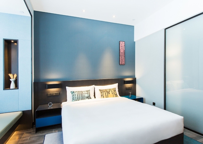 Imagen de la habitación del Hotel Rezen Yiting Hotel. Foto 4