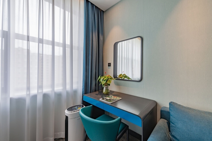 Imagen de la habitación del Hotel Rezen Yiting Hotel. Foto 8