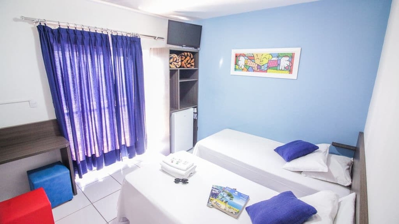 Imagen de la habitación del Hotel Rezende Suites. Foto 10