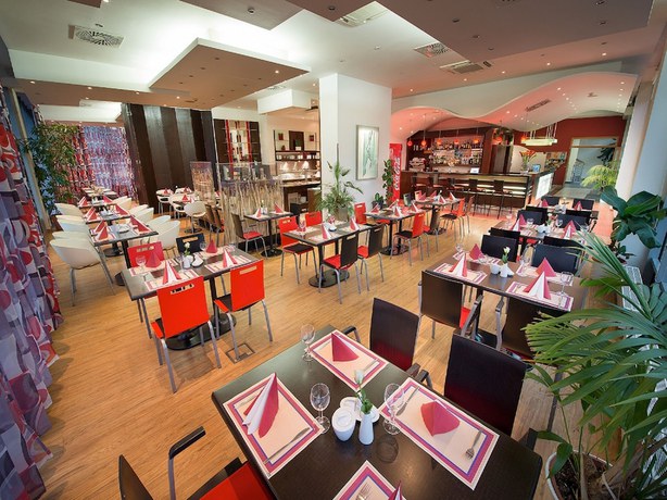 Imagen del bar/restaurante del Hotel Rezidence Emmy. Foto 2