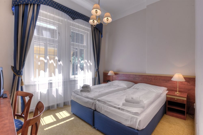 Imagen de la habitación del Hotel Rezidence Villa Gloria. Foto 7