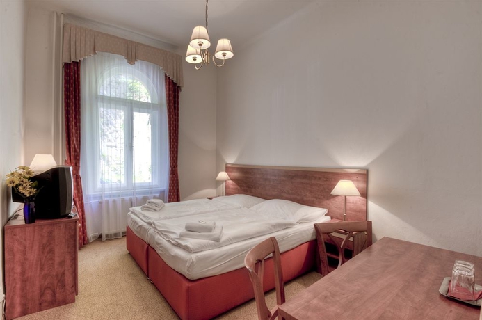 Imagen de la habitación del Hotel Rezidence Villa Gloria. Foto 10
