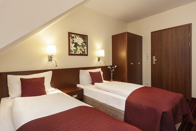 Imagen de la habitación del Hotel Rezydencja Dw&oacute;r Polski. Foto 13