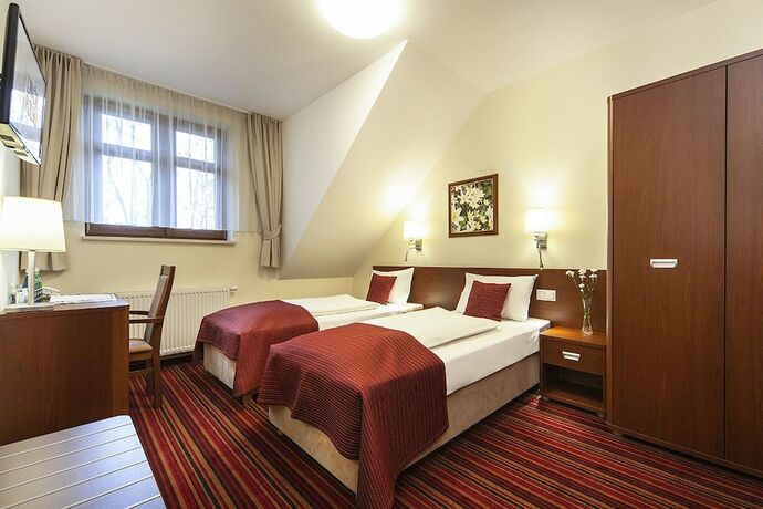 Imagen de la habitación del Hotel Rezydencja Dw&oacute;r Polski. Foto 17