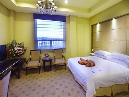 Imagen de la habitación del Hotel Rghcm Garden Resorts. Foto 9