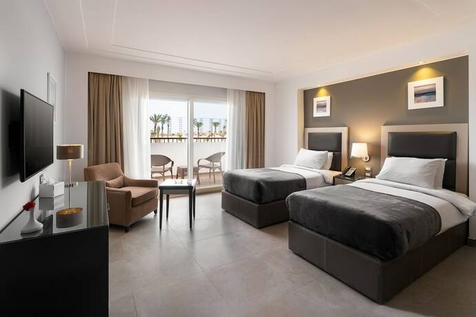 Imagen de la habitación del Hotel Rhactus New Alamein. Foto 10
