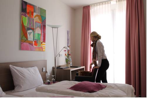 Imagen de la habitación del Hotel Rheinhotel Arte. Foto 12