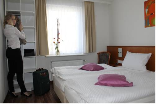 Imagen de la habitación del Hotel Rheinhotel Arte. Foto 15