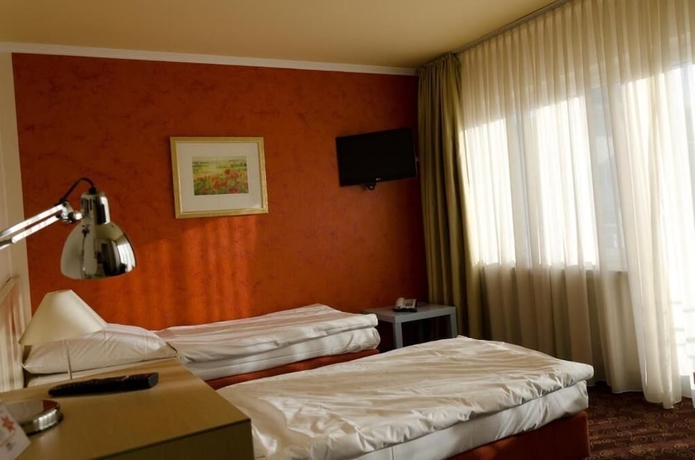 Imagen de la habitación del Hotel Rheinland. Foto 11