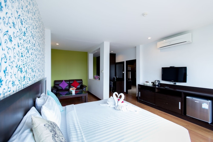 Imagen de la habitación del Hotel Rhienchai Place. Foto 6