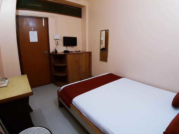 Imagen de la habitación del Hotel Rhino, Guwahati. Foto 2