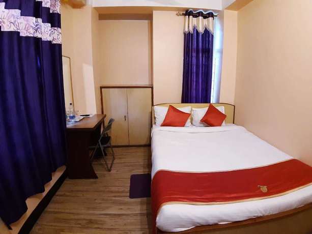 Imagen de la habitación del Hotel Rhino, Guwahati. Foto 5
