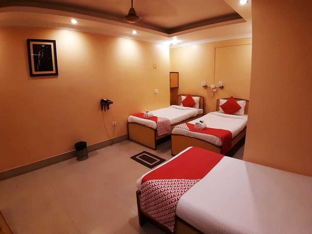 Imagen de la habitación del Hotel Rhino, Guwahati. Foto 7
