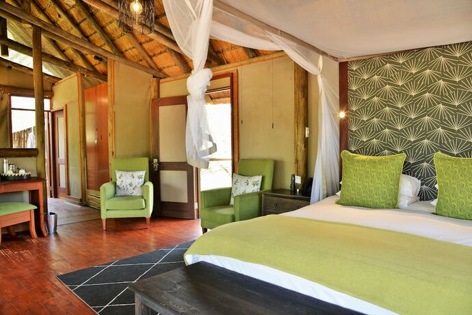 Imagen de la habitación del Hotel Rhino Post Safari Lodge. Foto 19