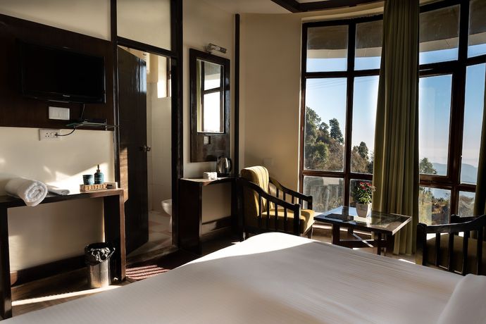 Imagen de la habitación del Hotel Rhodo Inn. Foto 4