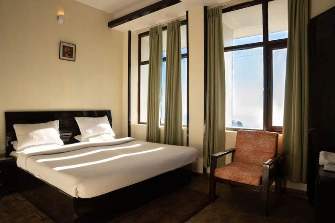 Imagen de la habitación del Hotel Rhodo Inn. Foto 5
