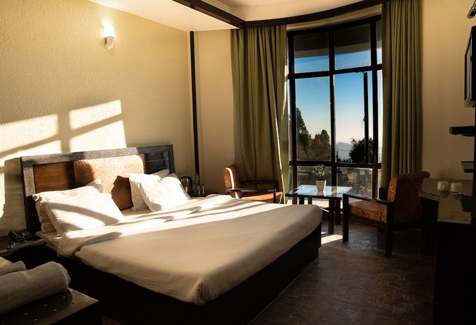 Imagen de la habitación del Hotel Rhodo Inn. Foto 6