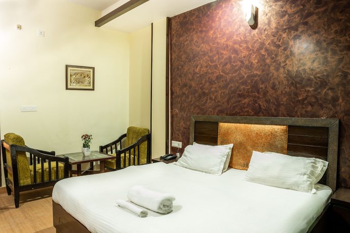 Imagen de la habitación del Hotel Rhodo Inn. Foto 8
