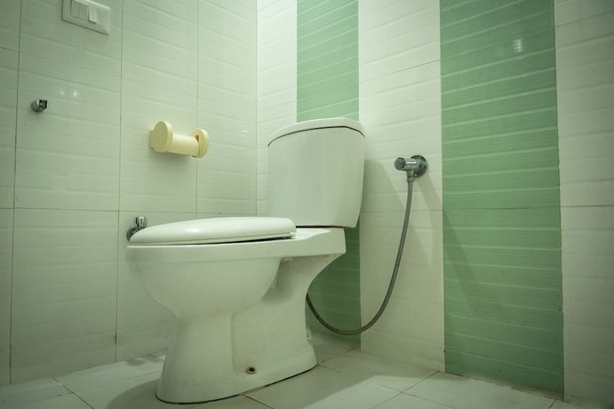 Imagen de la habitación del Hotel Rhodo Inn. Foto 10