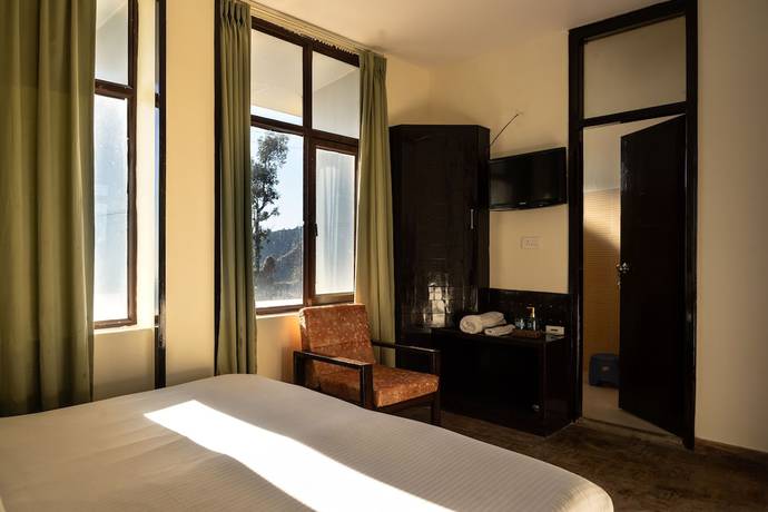 Imagen de la habitación del Hotel Rhodo Inn. Foto 12