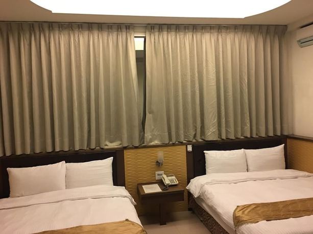 Imagen de la habitación del Hotel Ri Yue Hu Pan. Foto 3