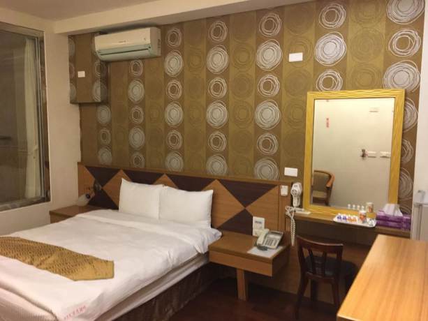 Imagen de la habitación del Hotel Ri Yue Hu Pan. Foto 5
