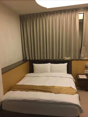Imagen de la habitación del Hotel Ri Yue Hu Pan. Foto 16