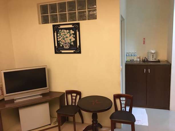 Imagen de la habitación del Hotel Ri Yue Hu Pan. Foto 17