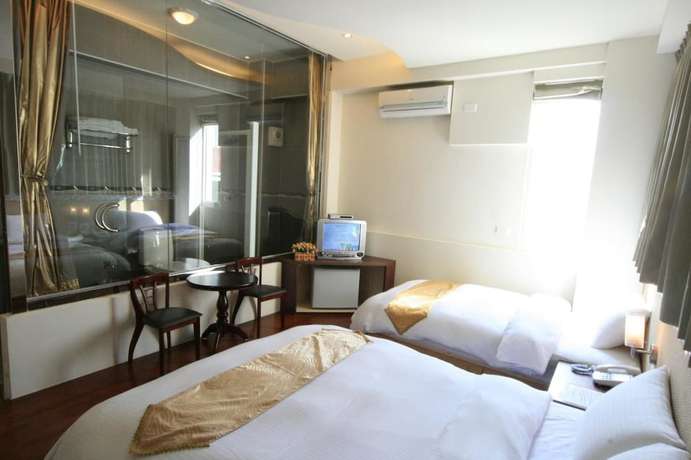 Imagen de la habitación del Hotel Ri Yue Hu Pan. Foto 18