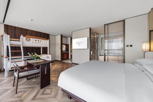 Imagen general del Hotel RiZhao Mumian. Foto 3