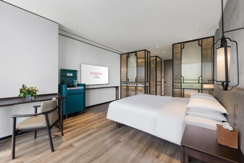 Imagen general del Hotel RiZhao Mumian. Foto 11