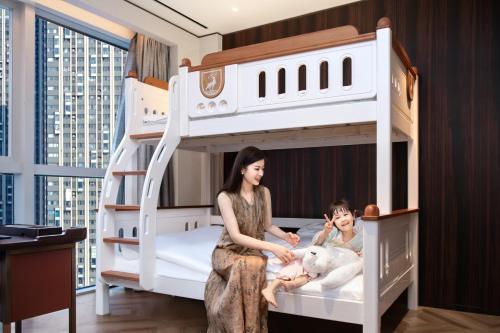 Imagen de la habitación del Hotel RiZhao Mumian. Foto 17