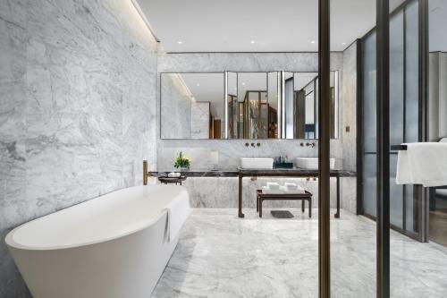 Imagen de la habitación del Hotel RiZhao Mumian. Foto 18