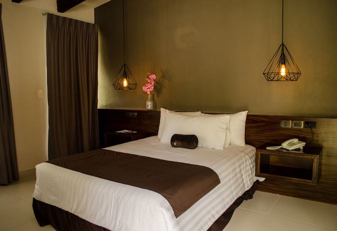 Imagen de la habitación del Hotel R&iacute;o Tinto Boutique. Foto 12