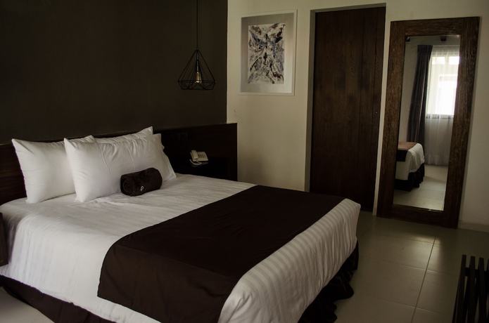 Imagen de la habitación del Hotel R&iacute;o Tinto Boutique. Foto 15