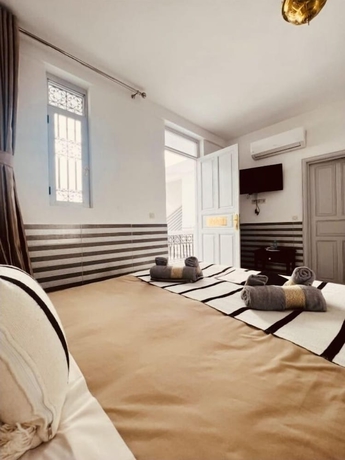 Imagen de la habitación del Hotel Riad Allal. Foto 13