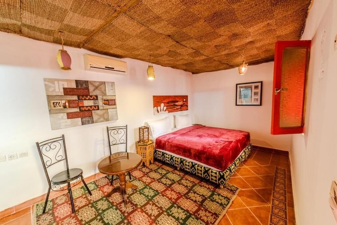 Imagen de la habitación del Hotel Riad Amira Luxury Palace. Foto 11