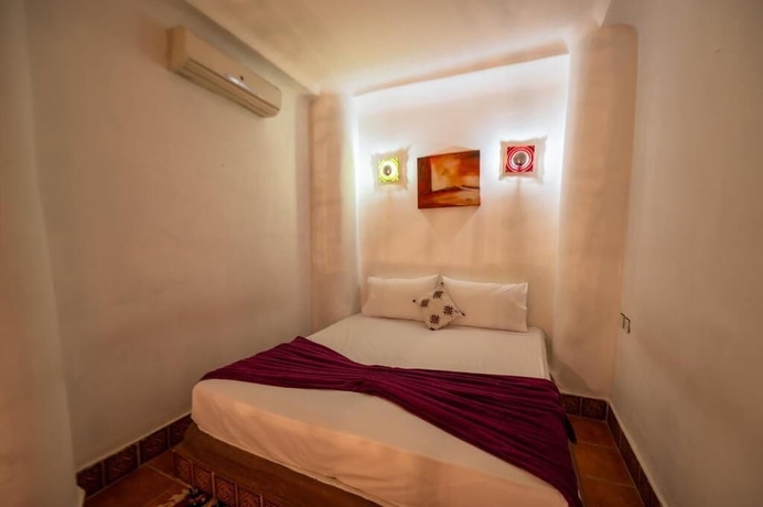 Imagen de la habitación del Hotel Riad Amira Luxury Palace. Foto 12