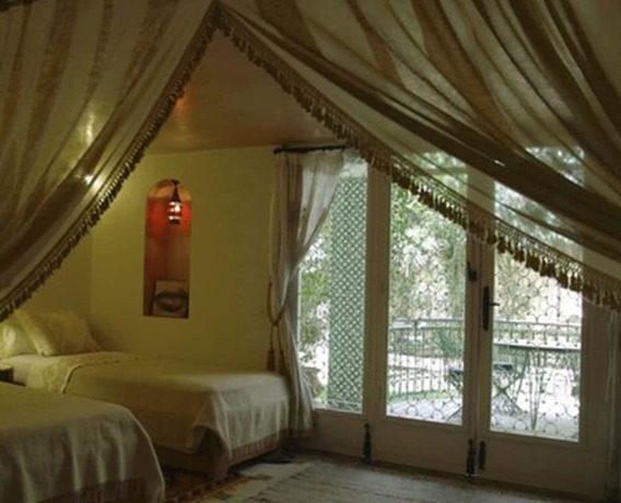 Imagen de la habitación del Hotel Riad Dar Ziryab. Foto 5